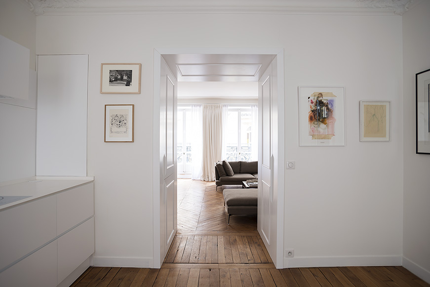 View from the kitchen through double doors to the living room