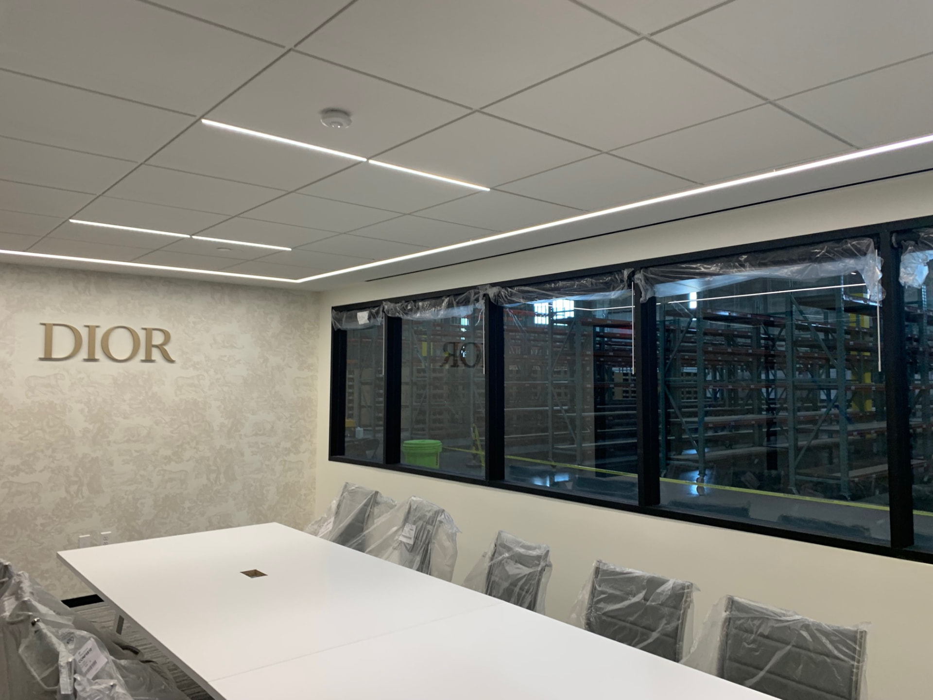 Dior boardroom overlooking the warehouse floor