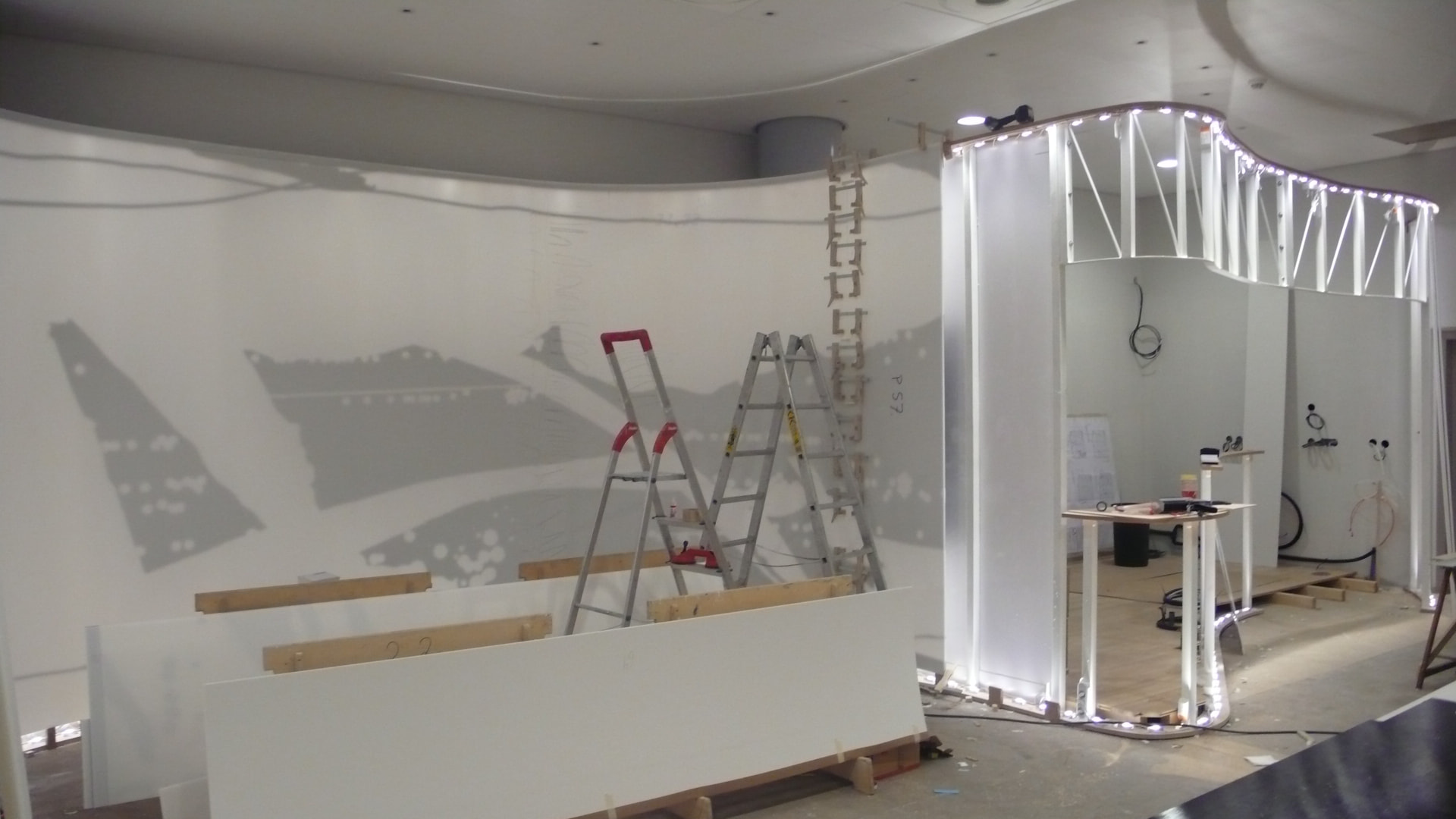Curved wall framework and LED lighting under construction on site