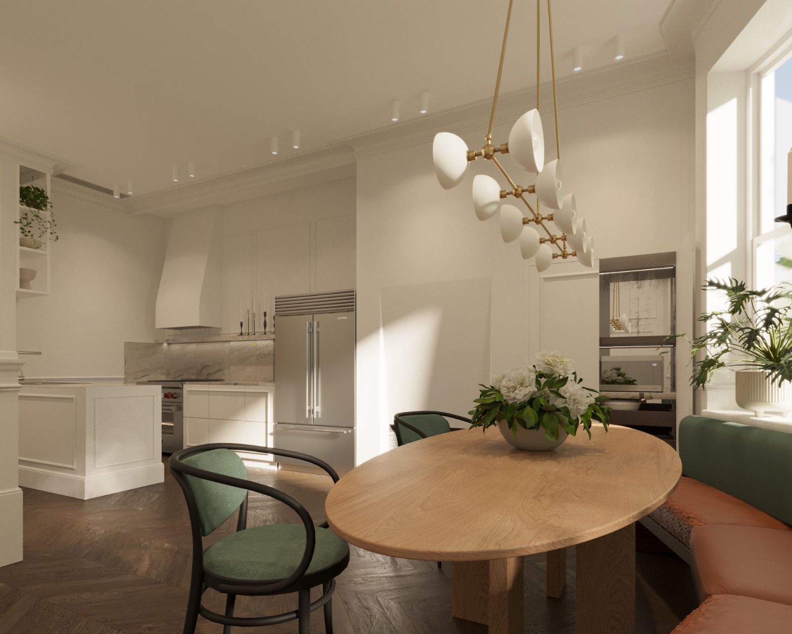 Duplex kitchen and dining area with oval oak table and brass chandelier