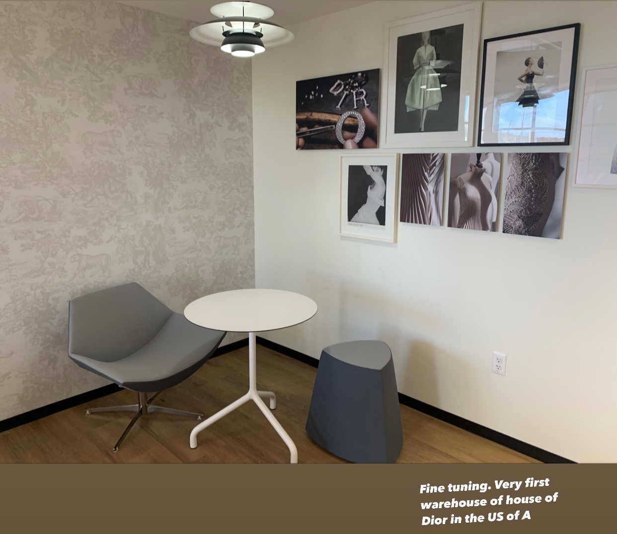 Dior meeting corner with toile wallpaper and framed archive photography