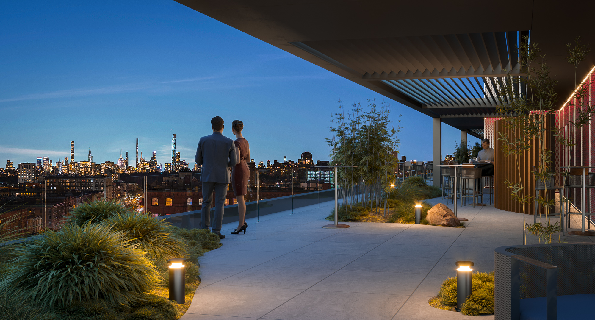 Rooftop terrace at dusk with pergola, bamboo planting and Manhattan skyline