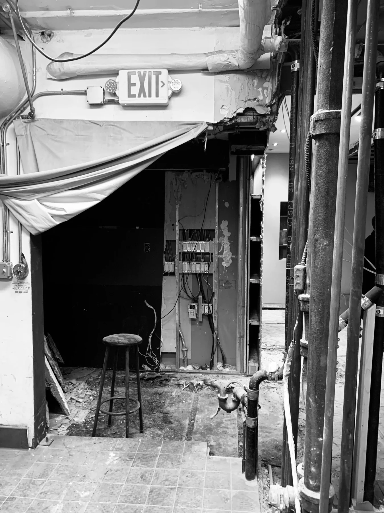 Le Chêne interior during demolition with exposed services and structure