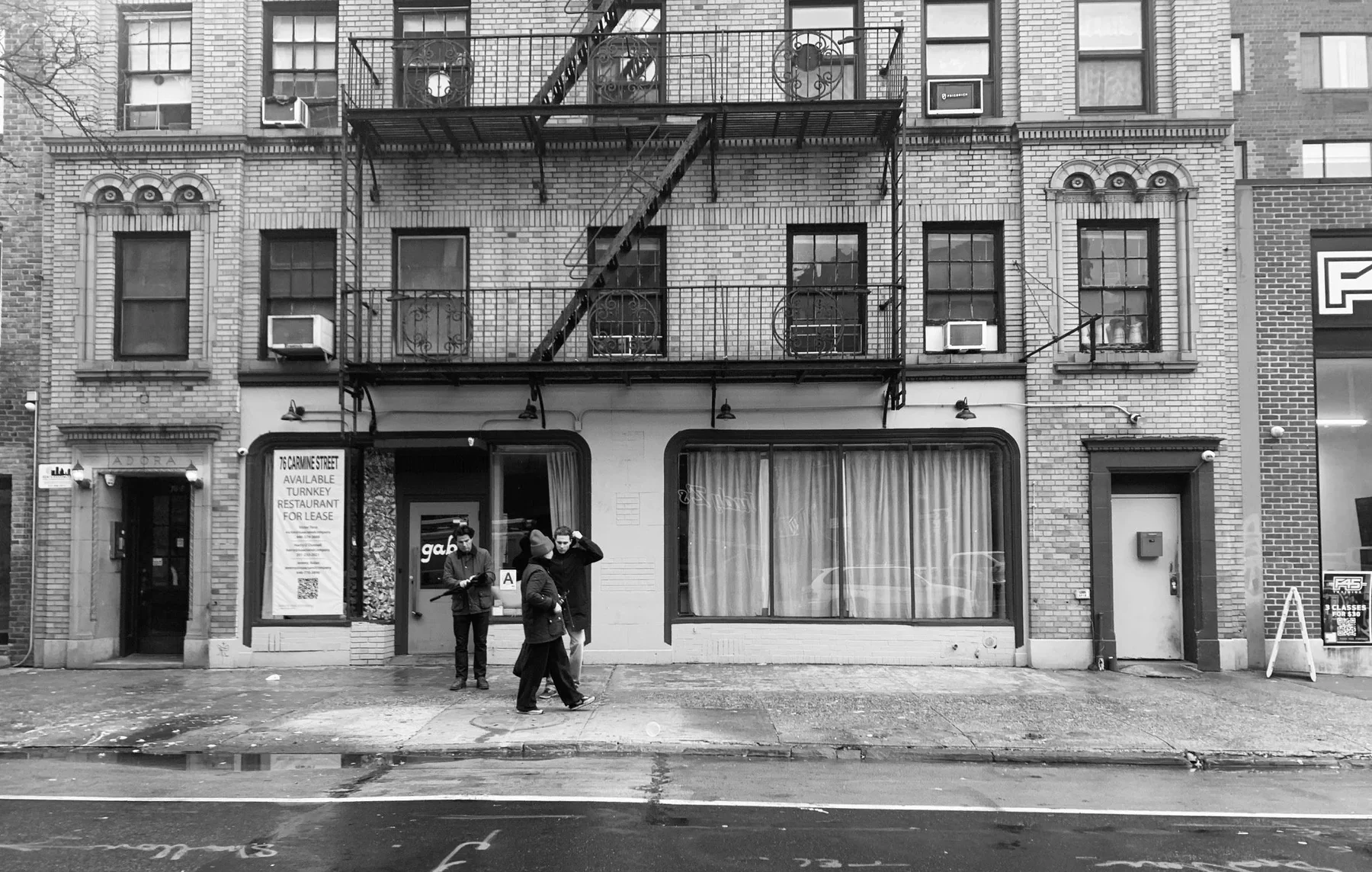 Fred evaluating the existing Le Chêne storefront before renovation